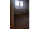 Bedroom featuring neutral walls and carpet, with natural light coming through a window at 10609 Sand Mountain Ave, Las Vegas, NV 89166