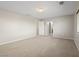 A spacious bonus room features neutral carpet and multiple entry doors at 10609 Sand Mountain Ave, Las Vegas, NV 89166