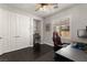 Bedroom with dark hardwood floors, shutters and closet at 11294 Corsica Mist Ave, Las Vegas, NV 89135