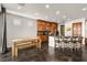 Bright kitchen features an island with seating and dining space with backyard access at 11294 Corsica Mist Ave, Las Vegas, NV 89135