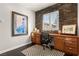 Home office with stone accent wall and built in cabinets at 11294 Corsica Mist Ave, Las Vegas, NV 89135