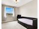 Cozy bedroom features a built-in daybed with storage drawers, neutral walls, and a bright window at 12426 Oregon Cherry Ave, Las Vegas, NV 89138
