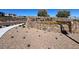 Bristle Vale entrance sign with stone masonry, landscaping, and a paved road at 12426 Oregon Cherry Ave, Las Vegas, NV 89138