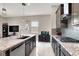 Modern kitchen with granite countertops, stainless steel appliances, and functional layout at 12426 Oregon Cherry Ave, Las Vegas, NV 89138