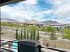Scenic view from balcony showing houses and mountains in the distance on a clear day at 12426 Oregon Cherry Ave, Las Vegas, NV 89138