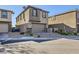Contemporary two-story home with an attached garage and well-maintained landscaping at 12532 Blissful Sky St, Las Vegas, NV 89138