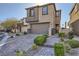 Charming two-story home boasting a manicured front yard and attached two-car garage at 12532 Blissful Sky St, Las Vegas, NV 89138
