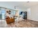 Spacious living room with comfortable seating and natural light at 12532 Blissful Sky St, Las Vegas, NV 89138