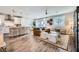Open concept living space featuring wood floors and contemporary decor throughout at 12532 Blissful Sky St, Las Vegas, NV 89138