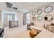 Loft area with a modern white sectional and stylish decor at 12532 Blissful Sky St, Las Vegas, NV 89138