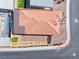 Aerial view of the home showing the tiled roof, desert landscaping, and private pool at 1319 Yosemite St, Boulder City, NV 89005