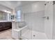 Stylish bathroom featuring glass shower, built-in bench, and double vanity at 1319 Yosemite St, Boulder City, NV 89005