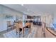 Dining area leading into an open kitchen with stainless steel appliances and eat-in island at 1319 Yosemite St, Boulder City, NV 89005