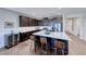 Spacious kitchen featuring a center island with seating, stainless steel appliances, and abundant cabinetry at 1319 Yosemite St, Boulder City, NV 89005
