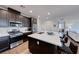 Open kitchen with a center island, stainless steel appliances and sleek countertops and ample cabinet space at 1319 Yosemite St, Boulder City, NV 89005