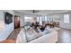 Spacious open-concept living area with dining table, hardwood floors, and a cozy seating arrangement at 1319 Yosemite St, Boulder City, NV 89005