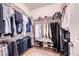 Organized walk-in closet with hanging racks, shelving, and ample storage space at 1319 Yosemite St, Boulder City, NV 89005