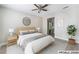 Bedroom with hardwood floors, ceiling fan, and bathroom access at 1400 Jamielinn Ln # 104, Las Vegas, NV 89110