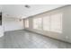 Large living area with lots of windows and tile flooring at 1400 Jamielinn Ln # 104, Las Vegas, NV 89110