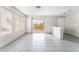 Bright living room with tile flooring and balcony access at 1400 Jamielinn Ln # 104, Las Vegas, NV 89110