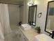 Modern bathroom featuring dual sinks, sleek fixtures, and a stylish shower for a luxurious experience at 1508 Silver Knoll Ave, Las Vegas, NV 89123