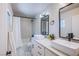 Modern bathroom featuring double vanity, rectangular sinks, and black fixtures at 1508 Silver Knoll Ave, Las Vegas, NV 89123