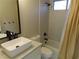 Modern bathroom features a vessel sink, shower with a window, and patterned shower tile at 1508 Silver Knoll Ave, Las Vegas, NV 89123
