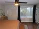 Bright primary bedroom with natural light, neutral décor, and wood flooring at 1508 Silver Knoll Ave, Las Vegas, NV 89123