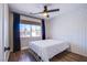 Bedroom with natural light, wood floor, ceiling fan, and modern design at 1508 Silver Knoll Ave, Las Vegas, NV 89123