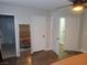 This bedroom features modern decor, wood flooring, and ample closet space for optimal storage solutions at 1508 Silver Knoll Ave, Las Vegas, NV 89123