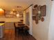 Modern dining area features wooden accents, natural light, and decor at 1508 Silver Knoll Ave, Las Vegas, NV 89123