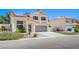 Two story home with a front yard that is xeriscaped at 1508 Silver Knoll Ave, Las Vegas, NV 89123
