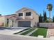 Charming two-story home features desert landscaping, a red tile roof, and solar panels at 1508 Silver Knoll Ave, Las Vegas, NV 89123