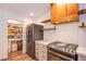 Kitchen with stainless steel refrigerator, gas range, and pantry at 1508 Silver Knoll Ave, Las Vegas, NV 89123