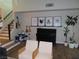 Welcoming living area features hardwood floors, natural light, and piano at 1508 Silver Knoll Ave, Las Vegas, NV 89123