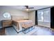 Main bedroom featuring wood floors, ceiling fan, and neutral tones at 1508 Silver Knoll Ave, Las Vegas, NV 89123