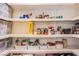 Walk-in pantry with shelving stocked with various food items at 1508 Silver Knoll Ave, Las Vegas, NV 89123