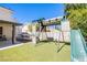 Backyard with a playset, trampoline, and artificial grass at 1508 Silver Knoll Ave, Las Vegas, NV 89123