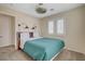 Bedroom with carpet and featuring sconces and a ceiling fan at 165 Calm Morning Ave, Henderson, NV 89002
