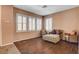 Bright living area with wood floors and plantation shutters bringing in plenty of natural light at 165 Calm Morning Ave, Henderson, NV 89002