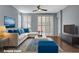 Cozy living room with a comfortable sofa, stylish decor, and plenty of natural light at 165 Calm Morning Ave, Henderson, NV 89002