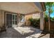 This covered patio with pavers offers an inviting space for outdoor relaxation and entertaining at 165 Calm Morning Ave, Henderson, NV 89002