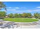 A well-maintained green space has walking paths and landscaping in a residential area at 2104 Leatherbridge Ct, North Las Vegas, NV 89081