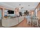Open-concept living space including a living room, dining area, and kitchen, perfect for entertaining and everyday living at 2104 Leatherbridge Ct, North Las Vegas, NV 89081