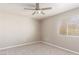 Bedroom with neutral walls, carpet flooring, a ceiling fan, and a window with horizontal blinds at 2143 Vista Famosa Ct, Las Vegas, NV 89123