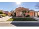 Charming single-Gathering home with a well-manicured lawn and a two-car garage at 2143 Vista Famosa Ct, Las Vegas, NV 89123