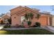 Beautiful home featuring desert landscaping, an attached two-car garage, and a tiled roof at 2143 Vista Famosa Ct, Las Vegas, NV 89123