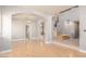 Spacious living area with hardwood floors, tiled entry, and a stairway to the second floor at 2143 Vista Famosa Ct, Las Vegas, NV 89123