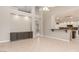 Bright living room with open layout, tile flooring, built-in shelving, and lots of light at 2143 Vista Famosa Ct, Las Vegas, NV 89123
