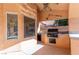 This outdoor kitchen features a built-in grill, a sink, and a serving area at 2143 Vista Famosa Ct, Las Vegas, NV 89123